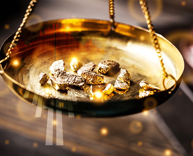 Goldpreise Gold in einer Goldwaage  