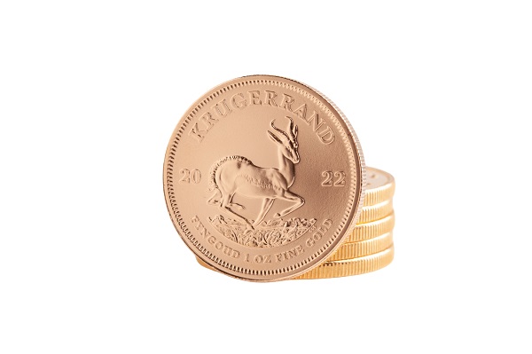 goldmuenze-kruegerrand-gold Krügerrand 1 Unze Goldmünze 2022 Stapel hinter den Münzen